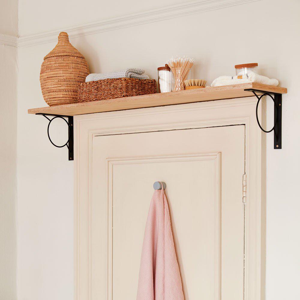 A shelf above a door