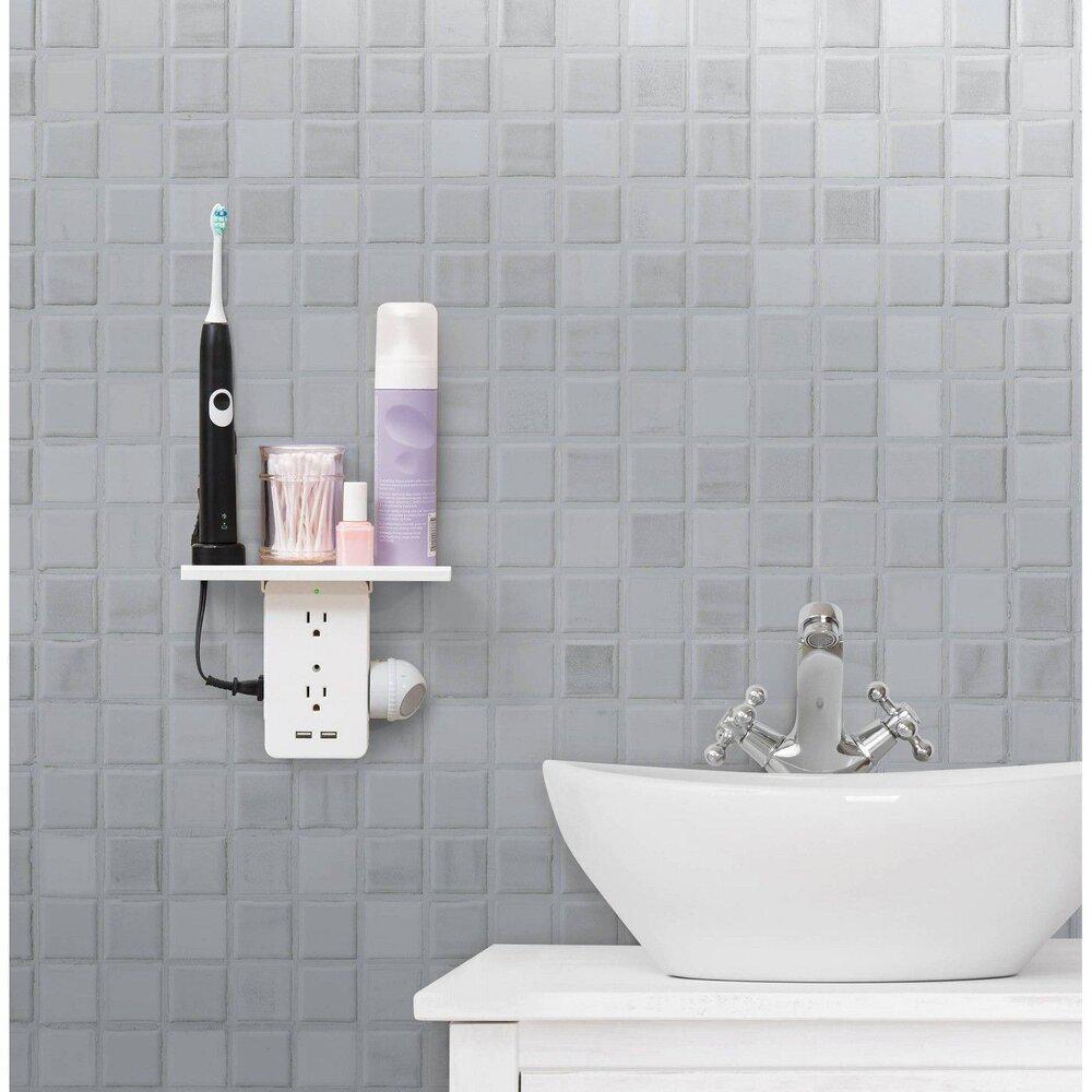 A shelf above an outlet