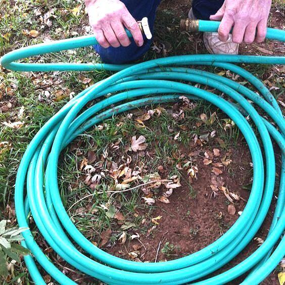 Person draining a hose