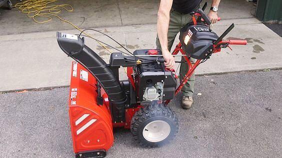 Snow blower being repaired