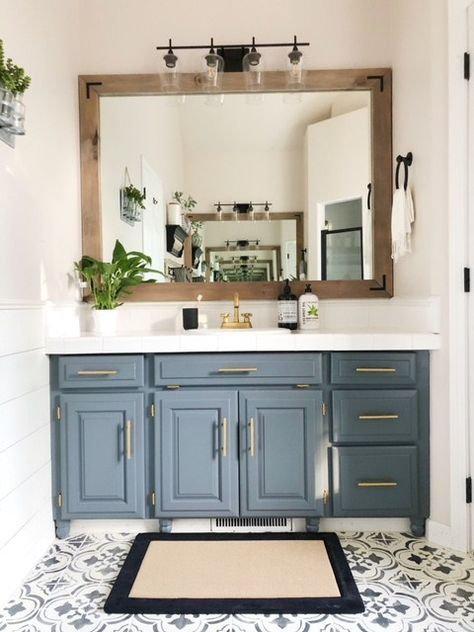 Bathroom mirror with a frame