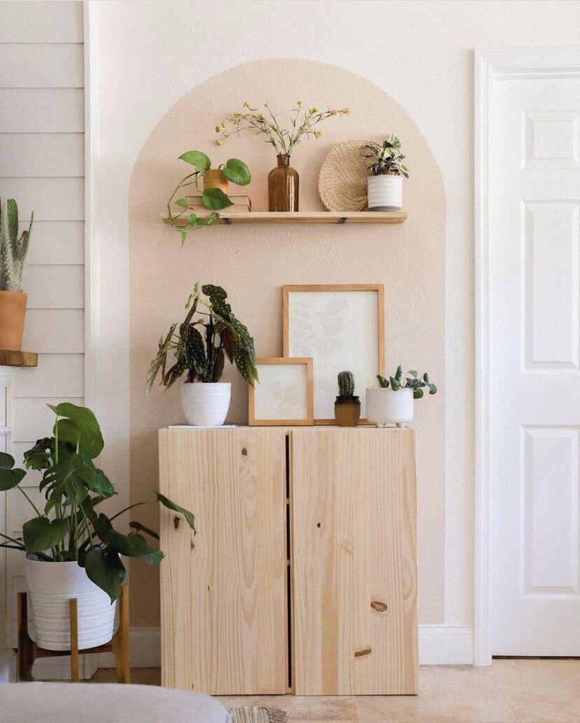 Arch painted behind shelf