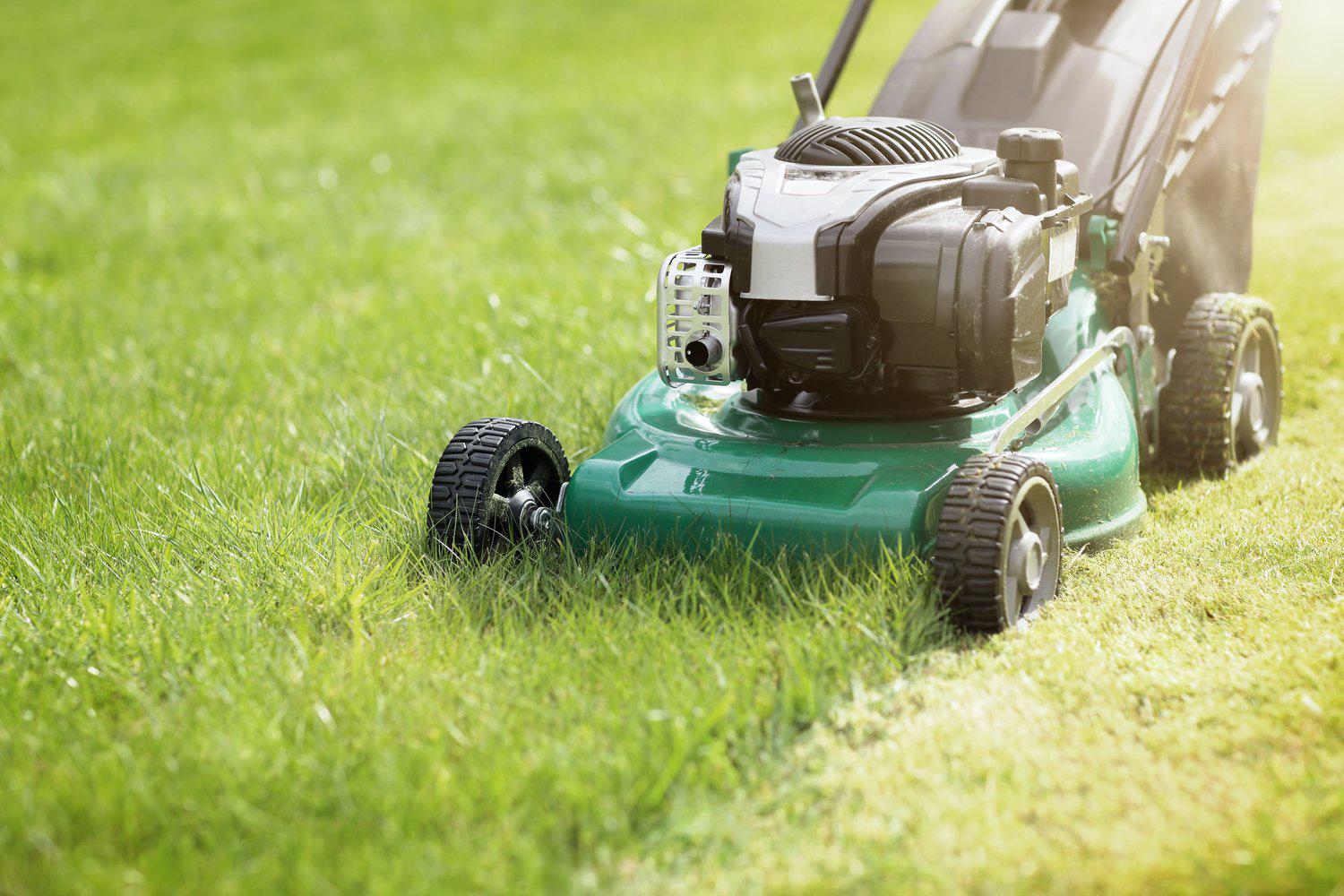 Lawn mower mowing lawn