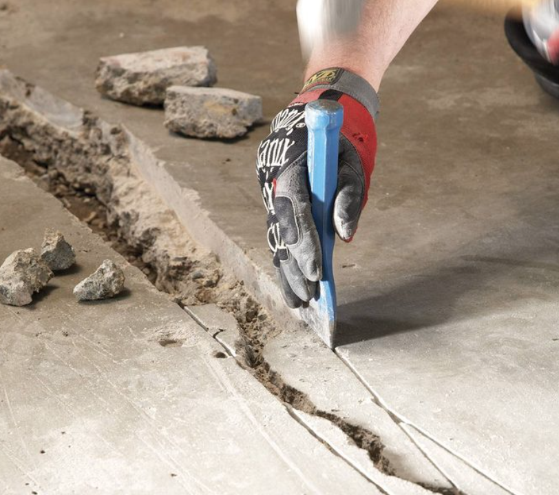 Concrete cracked being repaired