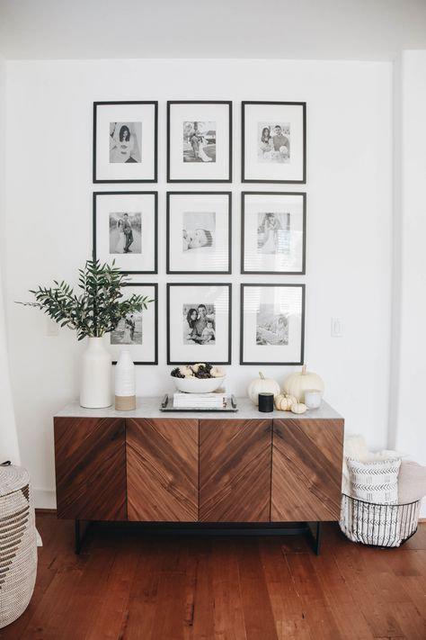 Pictures hung up on wall in a room