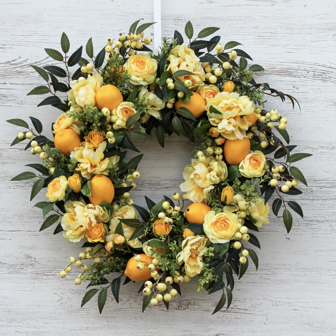 A lemon and yellow flower wreath